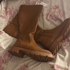 Never worn tall boots, American Eagle. Still has tags on them!